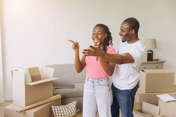 istock African couple moving into new home celebrating future 2242410047