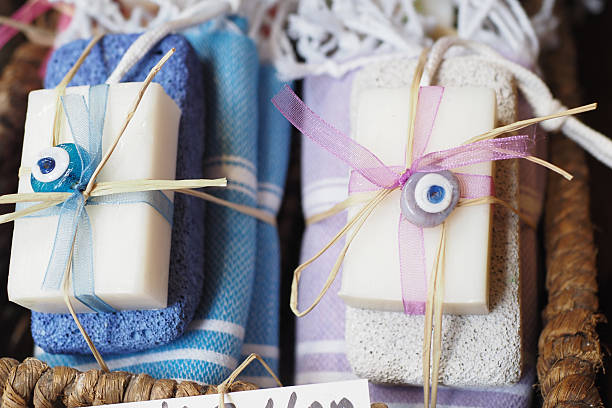 istock Beautifully wrapped handmade soaps in a basket display 2242413020