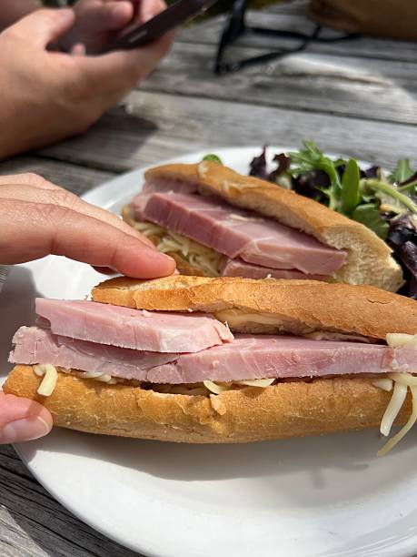 istock Baguette with big slices of ham 2242425091