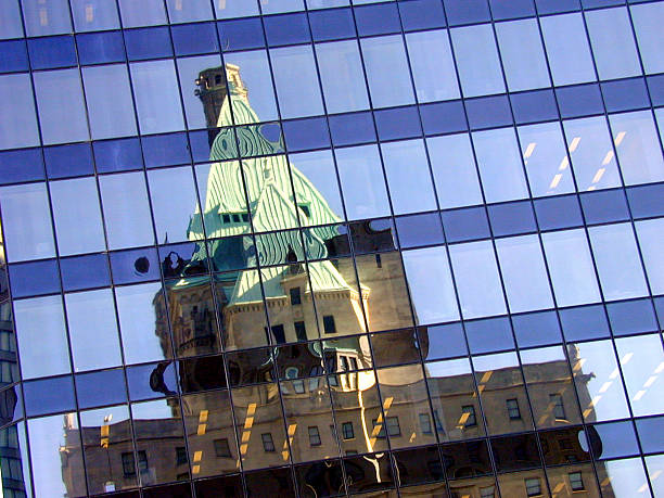 TD office tower reflects MNP Tower is a 35-story high-rise office building in Downtown Vancouver, British Columbia. Standing at a height of 143 metres, it is the sixth tallest building in the city and the tallest office building. It was designed by the American architectural firm Kohn Pedersen Fox. Construction of the building began in 2012 and was completed in 2014.