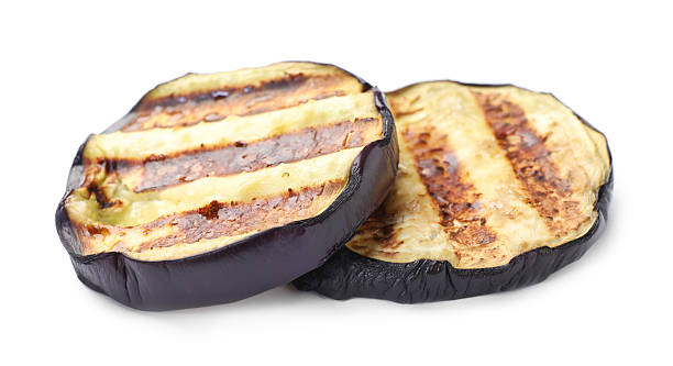 istock Slices of grilled eggplant isolated on white 2242437344