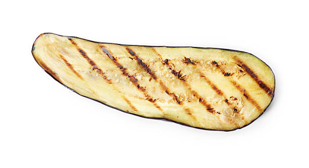 istock Slice of grilled eggplant isolated on white, top view 2242437457