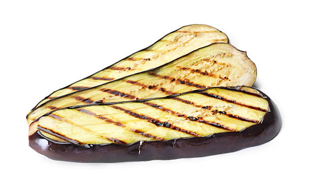 istock Slices of grilled eggplant isolated on white 2242437460