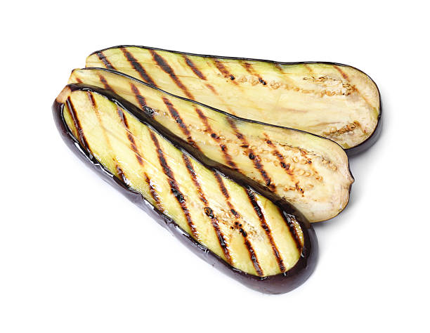 istock Slices of grilled eggplant isolated on white, top view 2242437507