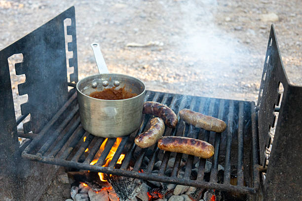 Bratwurst is a type of German sausage, traditionally made from pork, veal, or beef and seasoned with spices like nutmeg, marjoram, and caraway. Grilling is the ideal cooking method because it creates a flavorful, slightly charred, and caramelized skin while cooking the meat thoroughly, resulting in a juicy and delicious sausage.