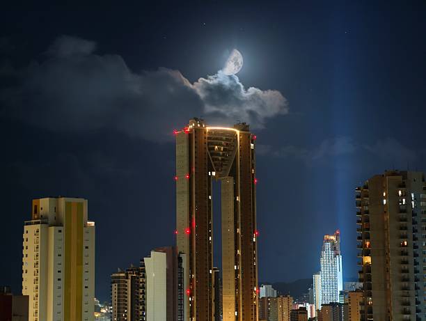 night city skyline, city skyline featuring glowing skyscraper with atmospheric nighttime ambiance