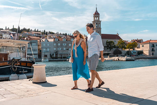 istock Mature Caucasian Couple Strolling Adriatic Coast 2242471870