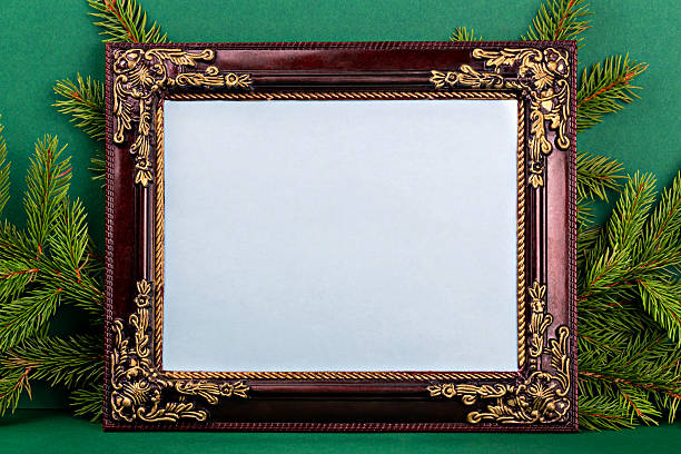 Wooden gilded vintage picture frame on white background isolated
