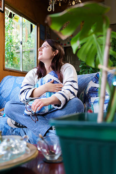 istock Young millennial woman relaxing in home during psychotherapy session 2242479310