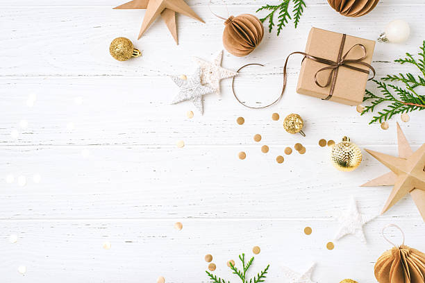 istock Festive Christmas background with gift box and Christmas decorations 2242479453
