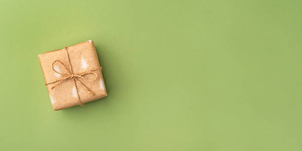 istock A Christmas gift wrapped in eco-friendly packaging 2242479470