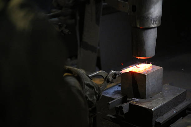 istock A craftsman who hammers heated materials into shapes 2242480511
