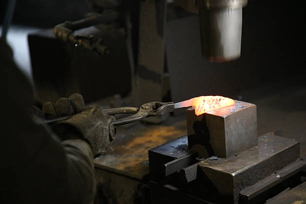 istock A craftsman who hammers heated materials into shapes 2242480520