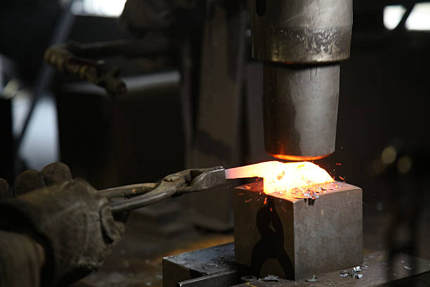 istock A craftsman who hammers heated materials into shapes 2242480545