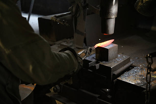 istock A craftsman who hammers heated materials into shapes 2242480641