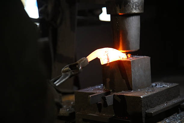 istock A craftsman who hammers heated materials into shapes 2242480675