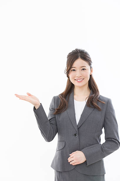 istock Asian businesswoman pointing 2242480987