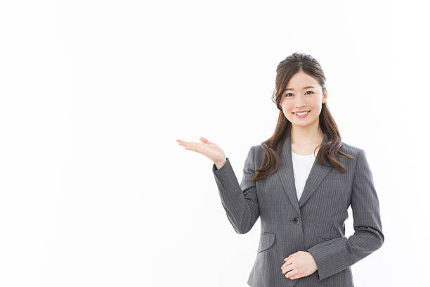 istock Asian businesswoman pointing 2242481012