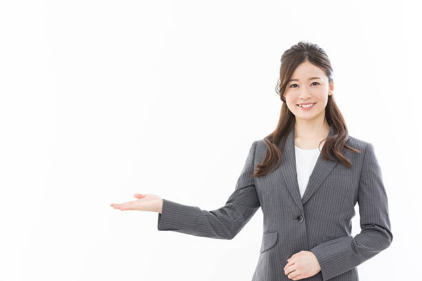 istock Asian businesswoman pointing 2242481017