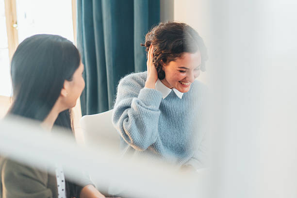 istock Business women in friendly conversation 2242481364