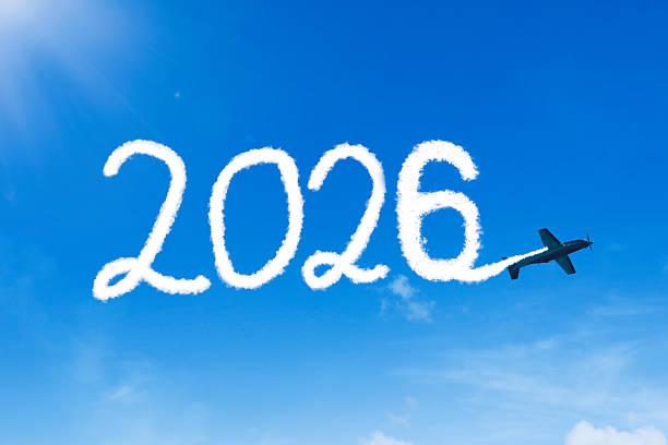 istock Year 2026 Written in Cloud Smoke by Airplane Propeller in a Bright Blue Sky 2242481509