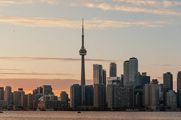 istock Toronto skyline with CN Tower at sunset over Lake Ontario 2242490413