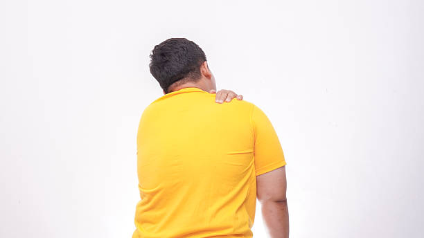 istock Asian fat man suffering upper back pain pain isolate on white background 2242496986