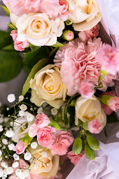 istock Beautiful elegant wedding bouquet, assorted flowers close up 2242497519