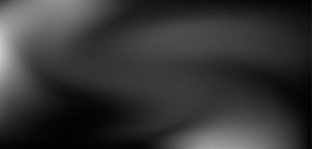 istock Abstract background design of rough and soft wave texture with blurred white and black colors. 2242499517