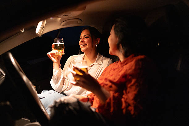 istock Close friends chatting in the car after work 2242499849
