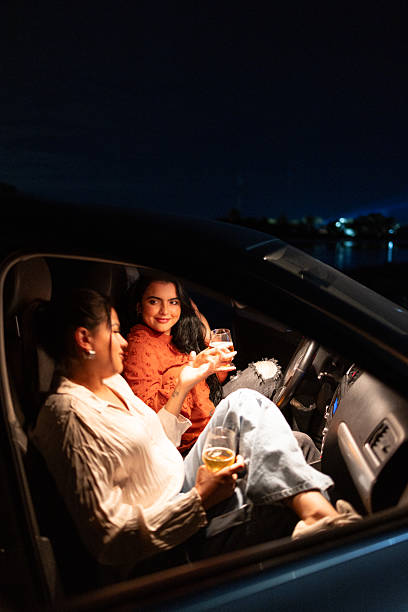 istock Close friends chatting in the car after work 2242499885