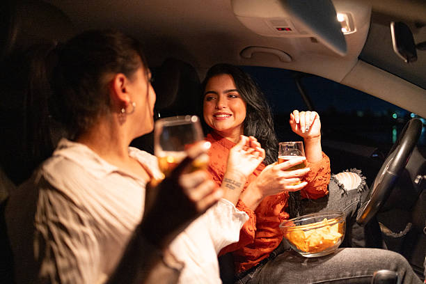 istock Close friends chatting in the car after work 2242499937