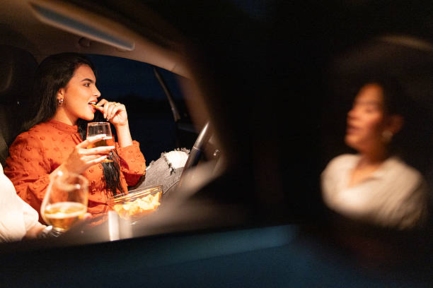 Close friends chatting in the car after work