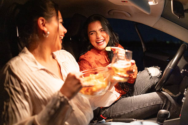 istock Close friends chatting in the car after work 2242499969