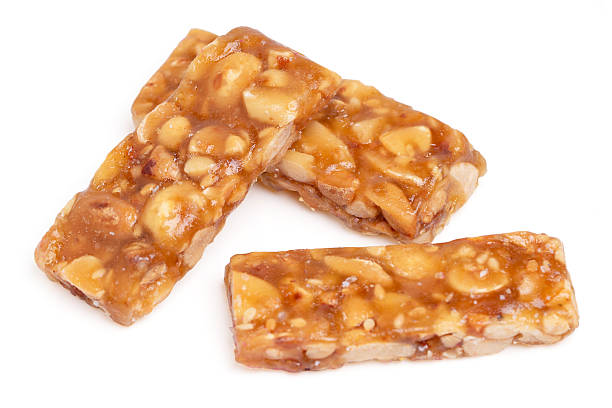 istock Top view honey bars with peanuts, sesame isolated on white background. 2242501180
