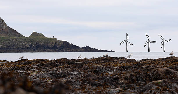 Filling up the gap / renewable energy concept: A hand-drawn offshore wind farm in the sea near Padstow in Cornwall.