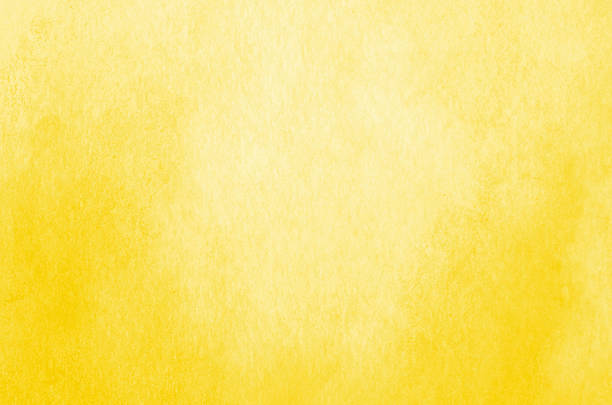 istock Abstract yellow watercolor background texture 2242506975