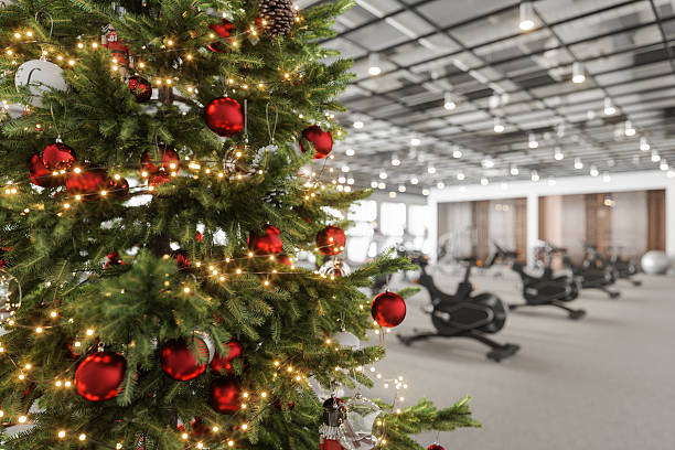 istock Christmas Decorations in Modern Gym Interior with Exercise Equipment 2242509499