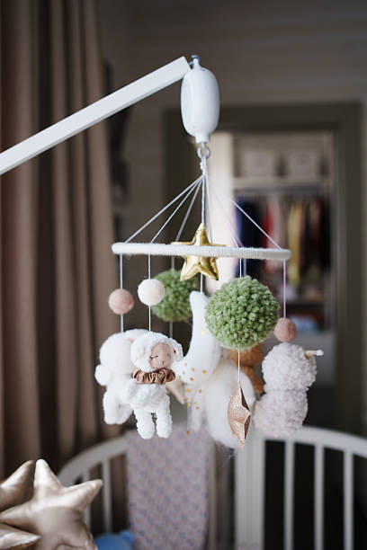 istock Soft nursery mobile with cute plush figures and decorations 2242521968