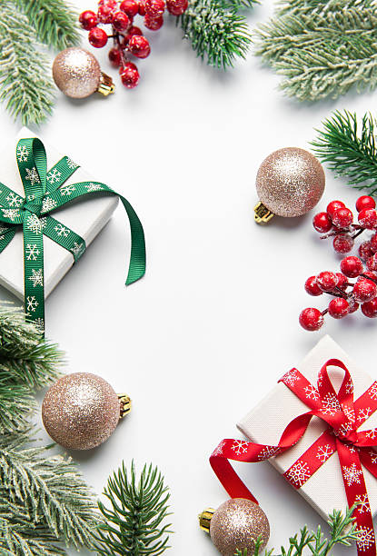 istock Christmas gifts and decorations forming a festive frame 2242522657