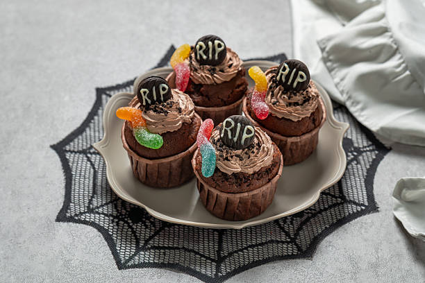istock Halloween cupcakes with RIP and gelly worm 2242523490