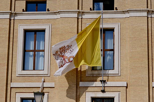 istock Vatican flag waving in the wind 2242523906