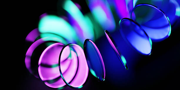 istock Neon glass circle discs - abstract ring shape on black 3d background. Luminous gradient lenses, crystal holographic round disks. Blurry radiant plates with circular motion effect 2242525486