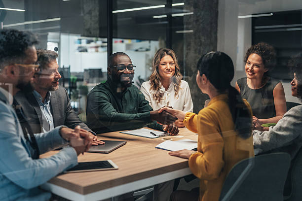 istock Diverse team in a business meeting collaborating on projects 2242528218