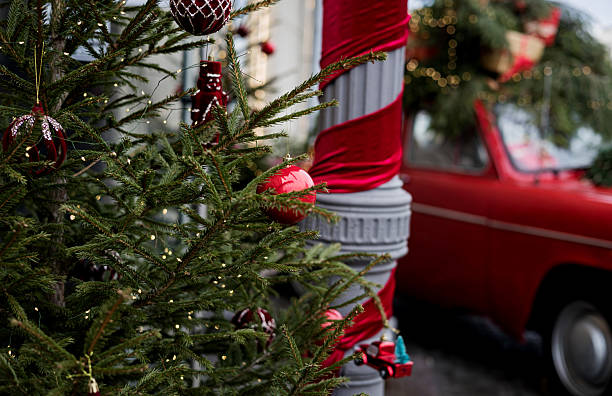 istock Red Christmas balls on a fir branches on festive 2242534424