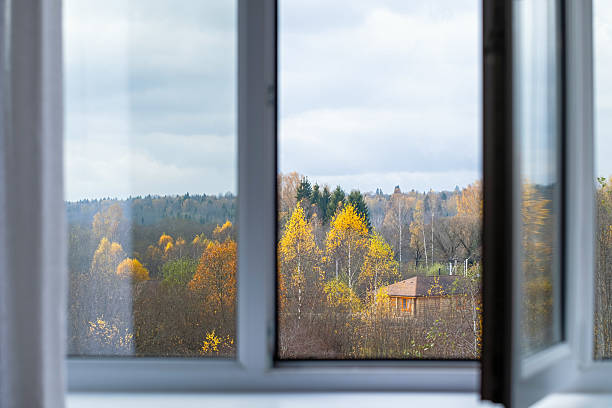 istock Open window, autumn forest view, countryside house 2242539304