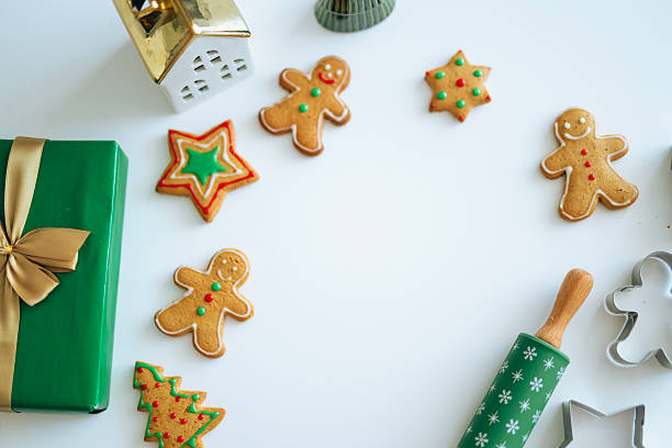 Christmas Cookies and Gift Box on Festive Background