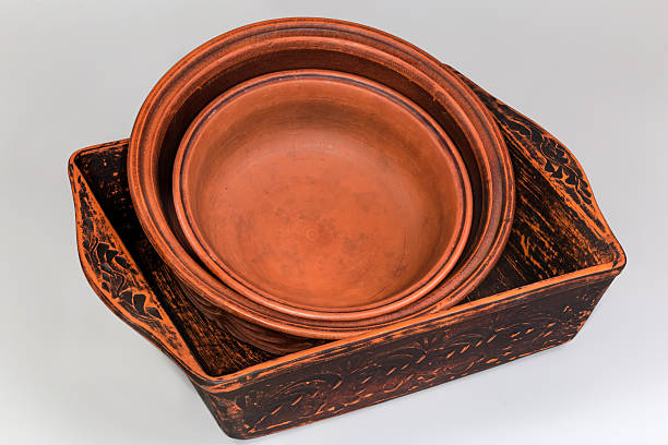 Ceramic pieces on wooden shelf