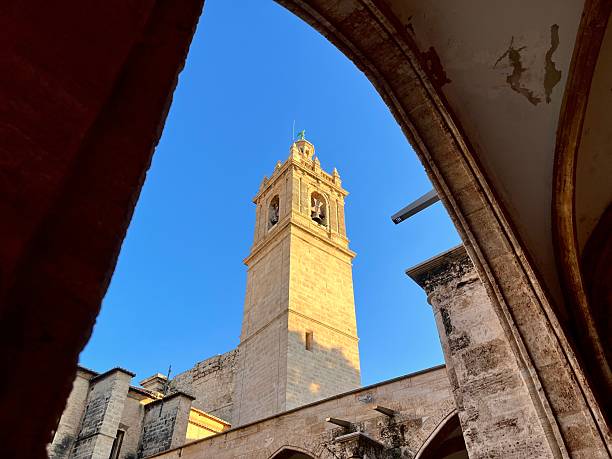 istock Cathedral bell tower framed by ancient archway in Valencia, Spain 2242550818