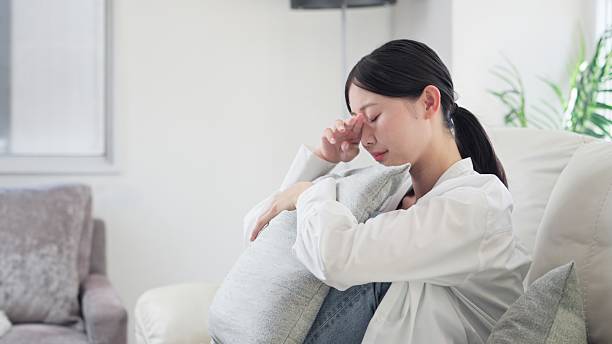 istock Sad and crying Asian woman 2242550940